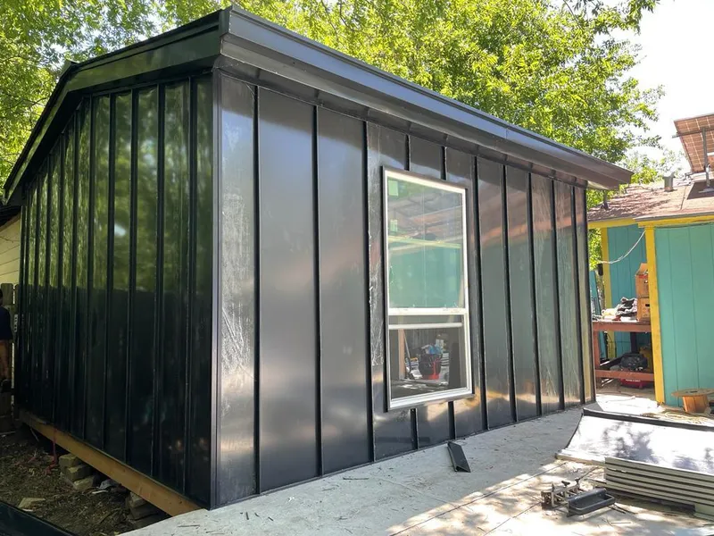 Black standing seam metal wall panels for Metal Roof Installation in Kingston